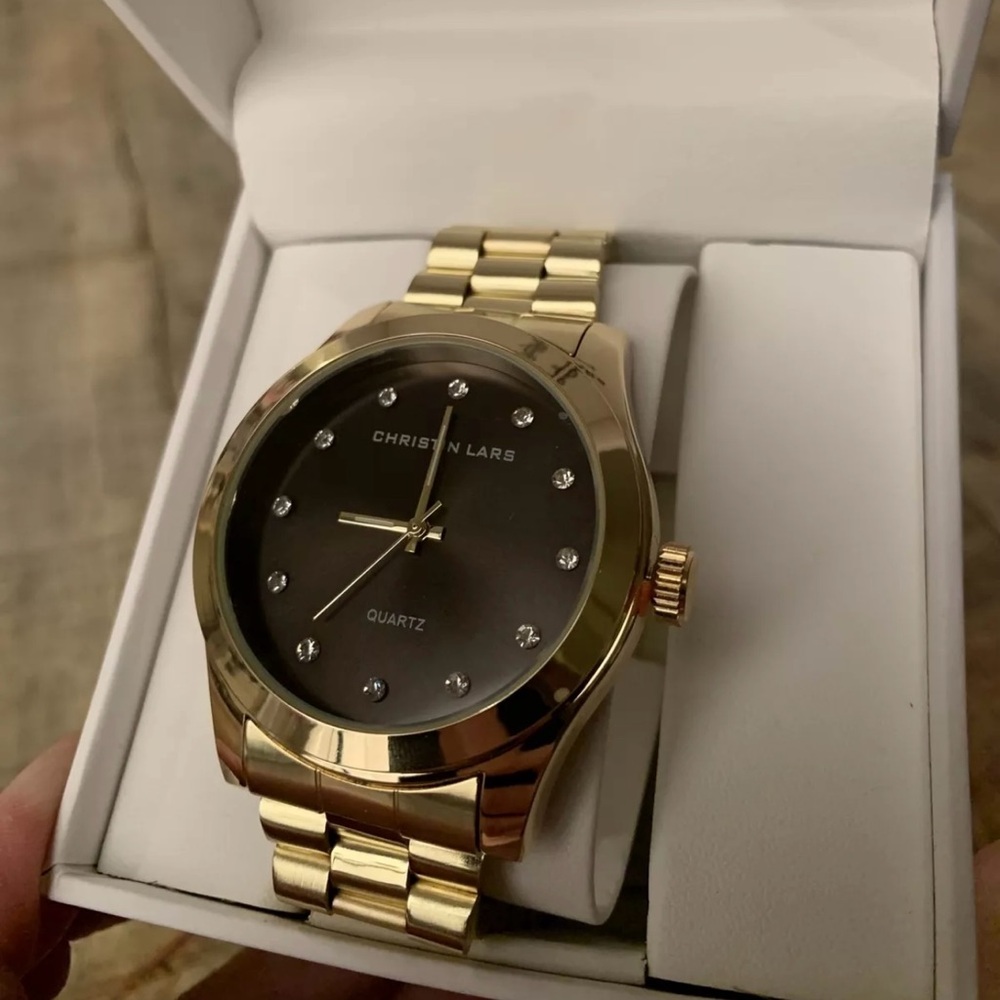 Christin Lars Women’s watch Gold Tones And Black dial NIB